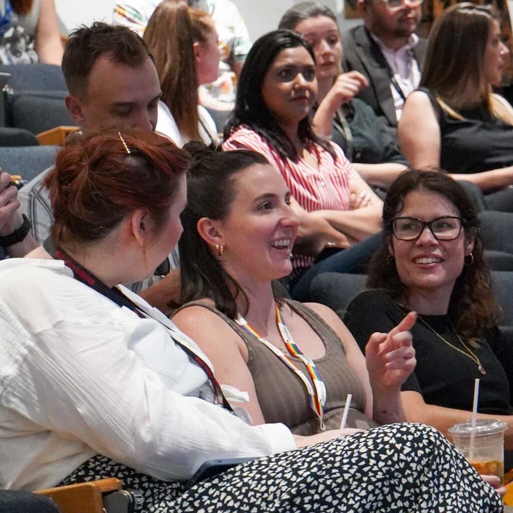 Members of the audience sitting in a lecture theatre as part of the 2025 UoG Festival of Learning