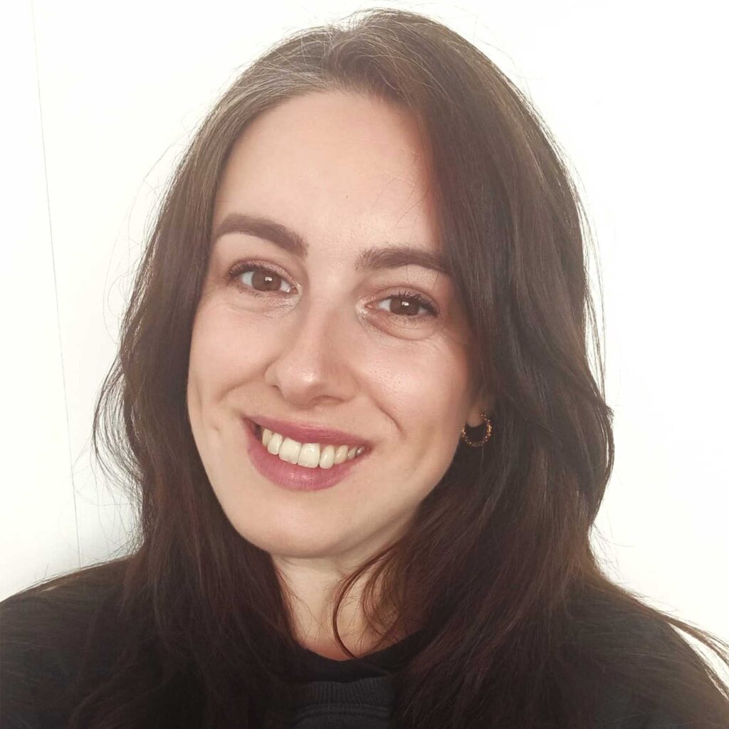Head and shoulders photograph of India Cole wearing a black top.